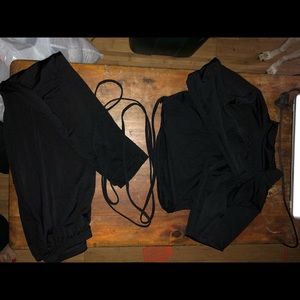 Two piece black tie around pant suit